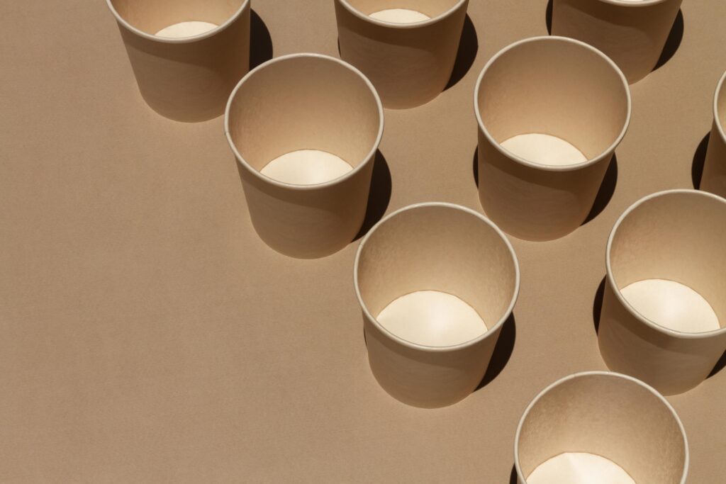 Recyclable Muffin Cups That Align Quality Performance And Sustainability high angle cups with copy space